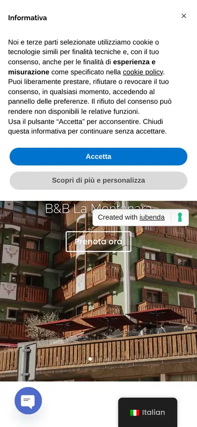 La prima schermata della home di oggi sul telefono: il banner dei cookie copre la metà alta, sotto lo slider con la facciata e Prenota ora